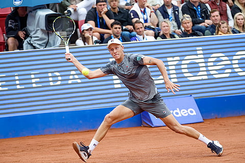 Leo Borg plays a shot against Rafael Nadal 